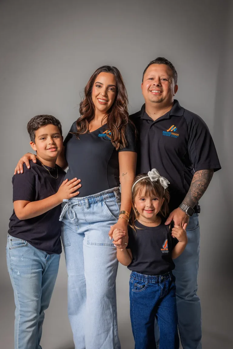 Nilson Silva with his wife Claudia and their children
